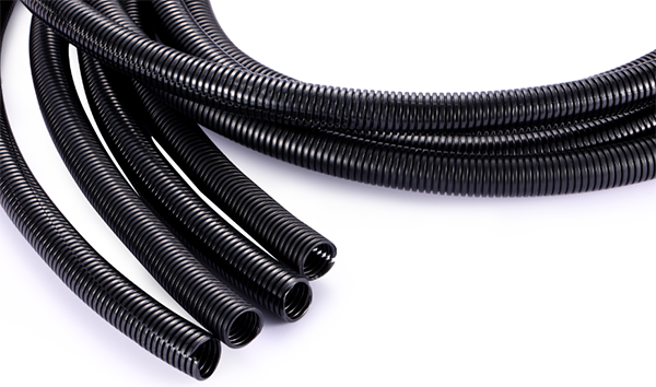 How is corrugated hose used in wiring harness